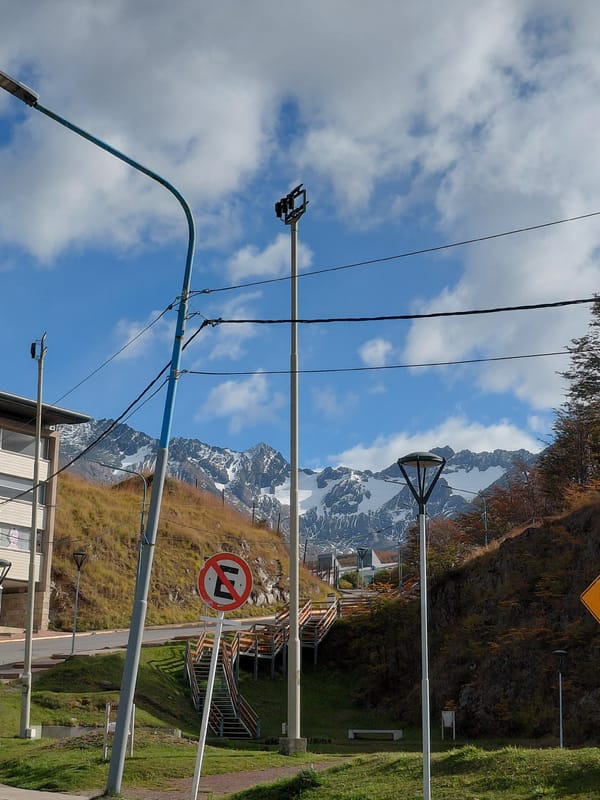 Mountain landscape viewed through power lines in Ushuaia, Argentina