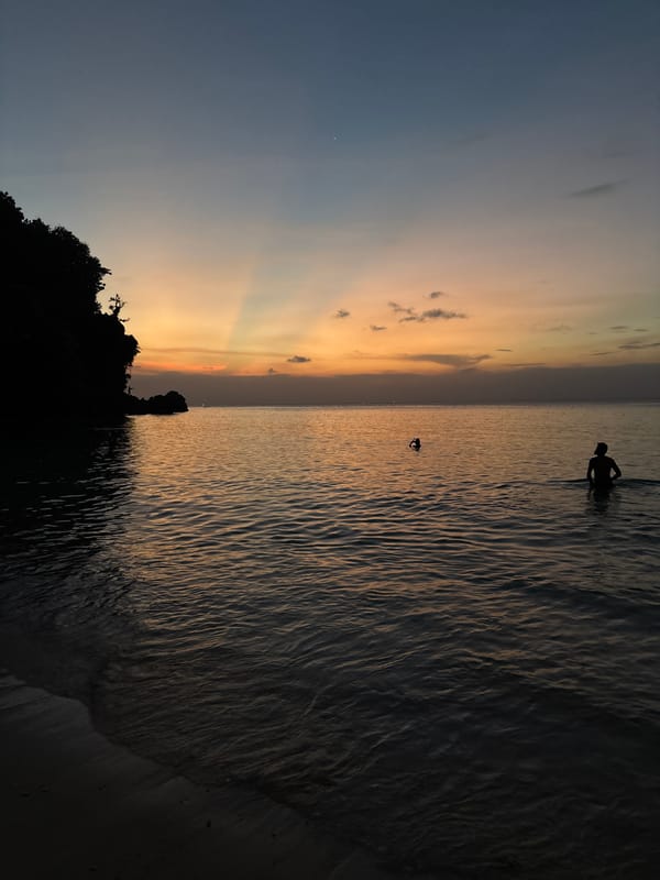 Sunset with crepuscular rays observed at Kuta Selatan beach