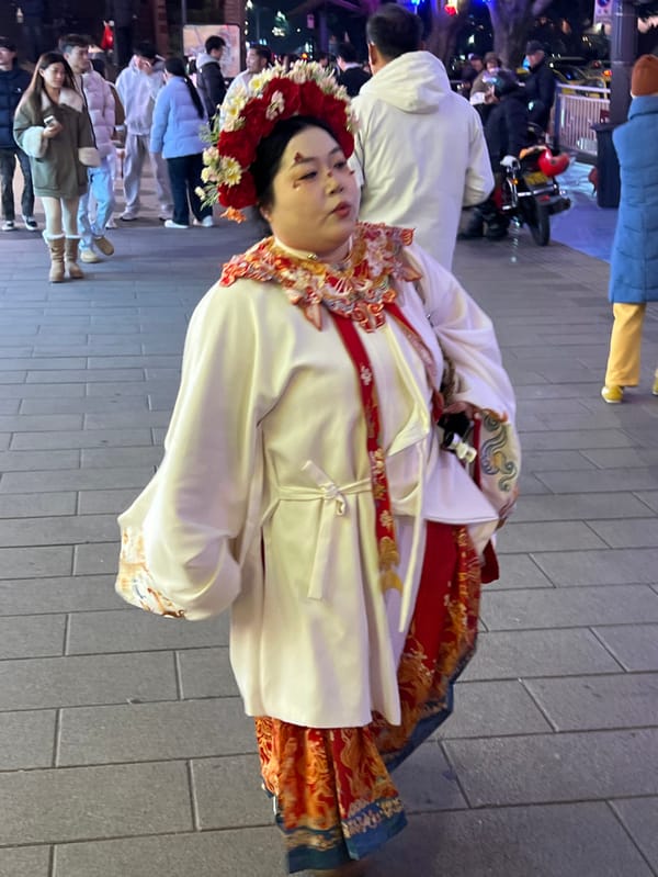 Traditional dress photo session in nighttime Chongqing district