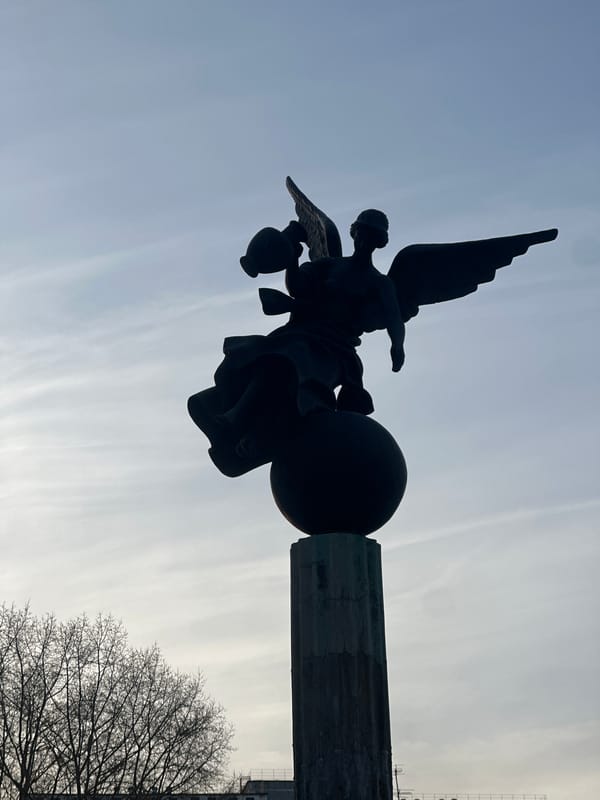 Woman visits angel monument in Surgut city square