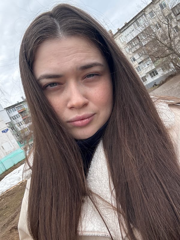 Young woman photographed in multiple close-ups in Chaikovsky, Russia