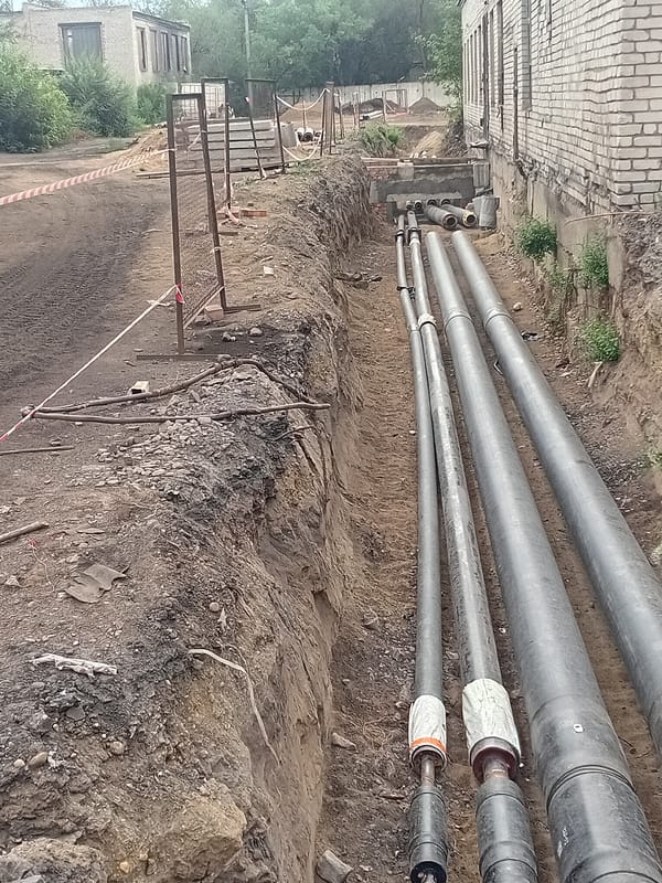 Pipe laying and building construction underway in Semey, Kazakhstan