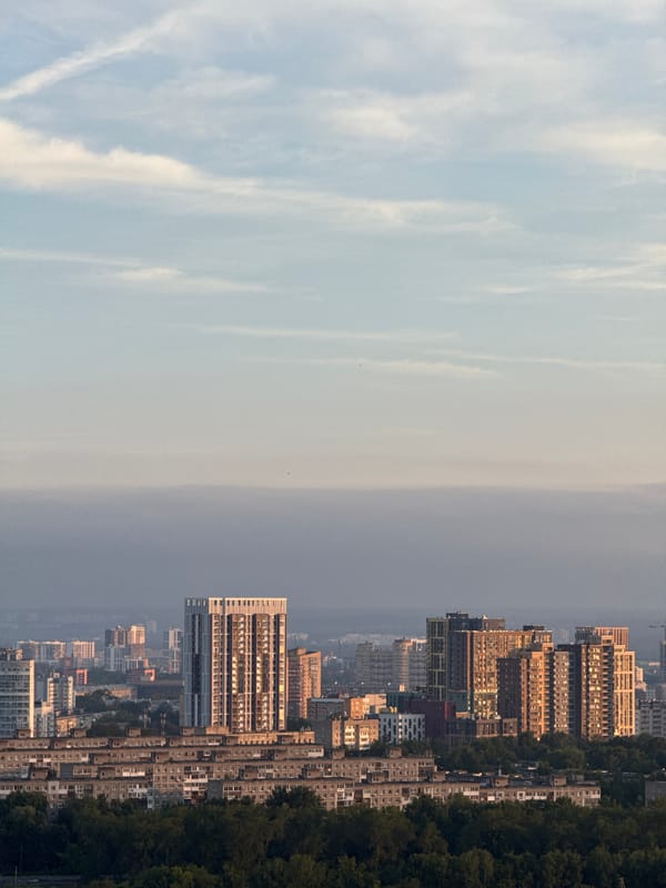Aerial views over Perm's wooden residential neighborhoods at dusk