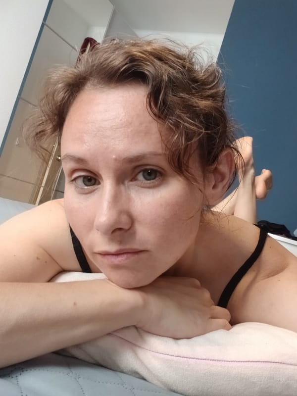 Casual close-up selfie on a bed in Yekaterinburg