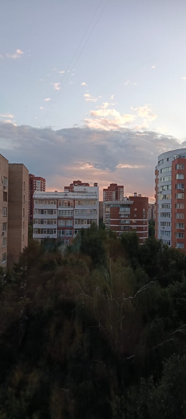 Moscow apartment interior and skyline at dusk