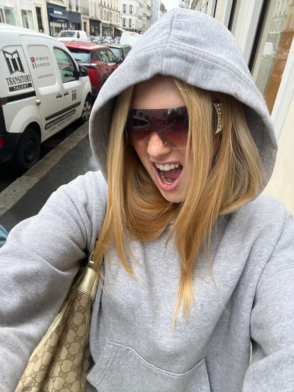Woman Takes Multiple Selfies Across Paris Locations Within Minutes