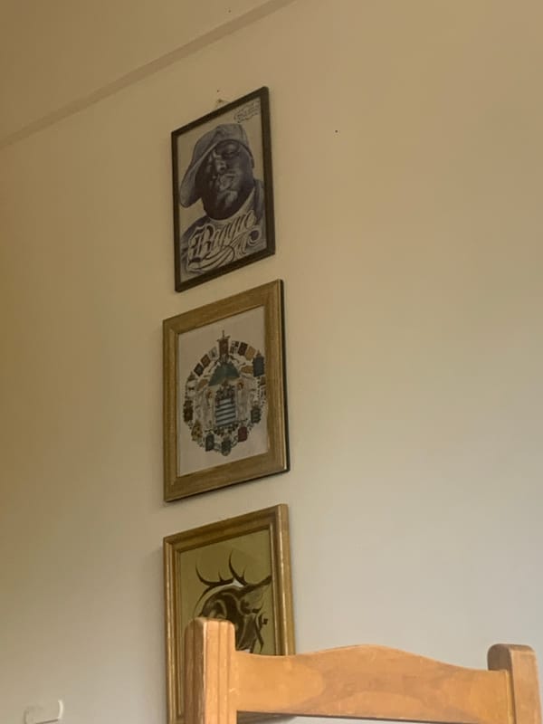 Three framed pictures displayed on wall in Buenos Aires