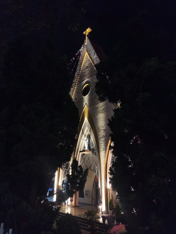 Nighttime illumination captured at Da Lat church and restaurant