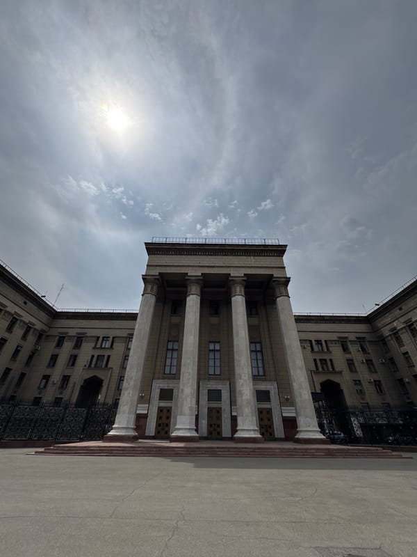 Almaty's neoclassical landmarks and a park fountain, up close