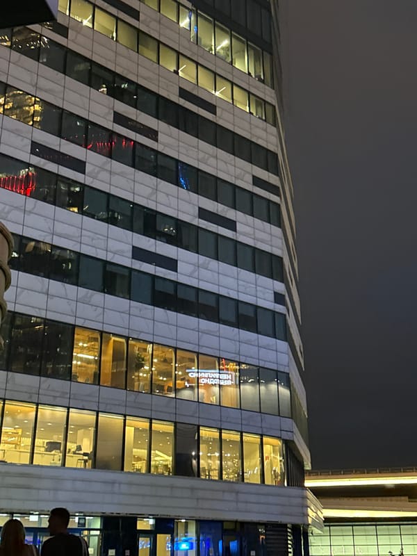 Modern building with patterned façade observed in Khimki nightscape