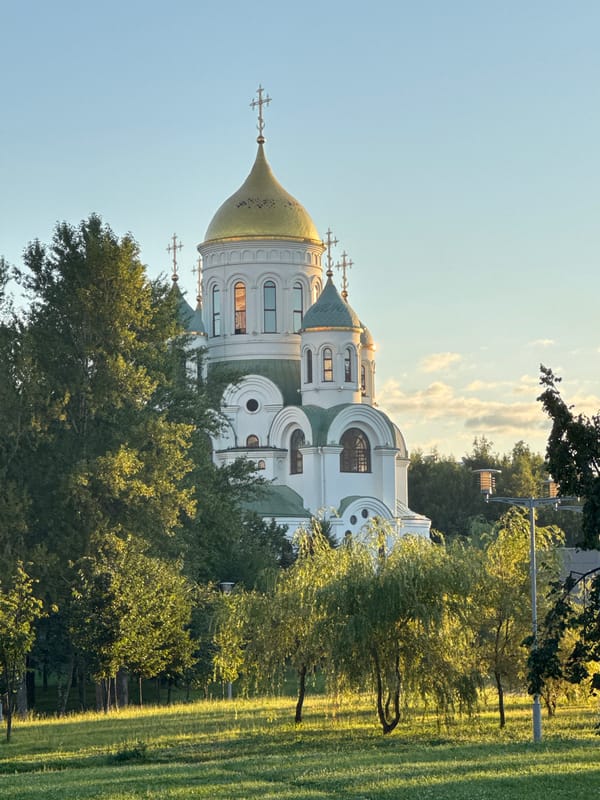 Golden hour across Moscow streets and Patriot Park church