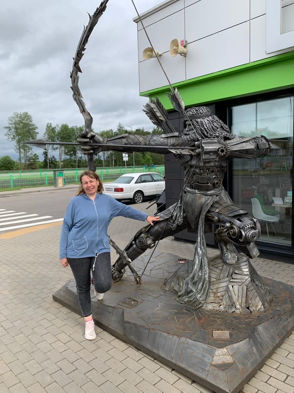Tourists visit metal archer sculpture in Belarus village