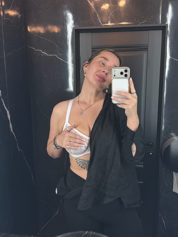 Woman takes bathroom selfie in Podolsk, Russia