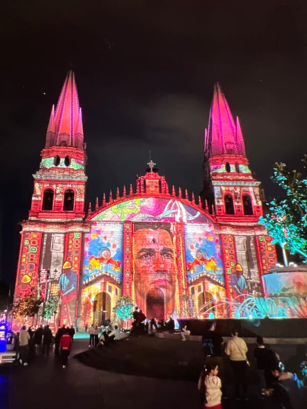 Illuminated historic facades and coastal landscapes at night and day
