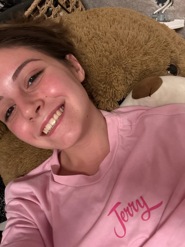Cozy bedroom selfies with a giant teddy bear and love balloons