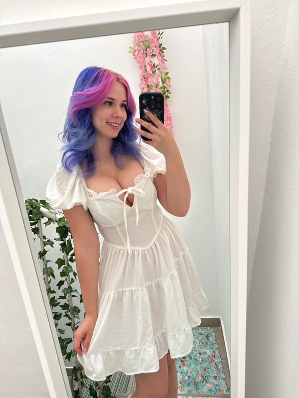 Woman takes colorful hair selfies in Zagreb apartment