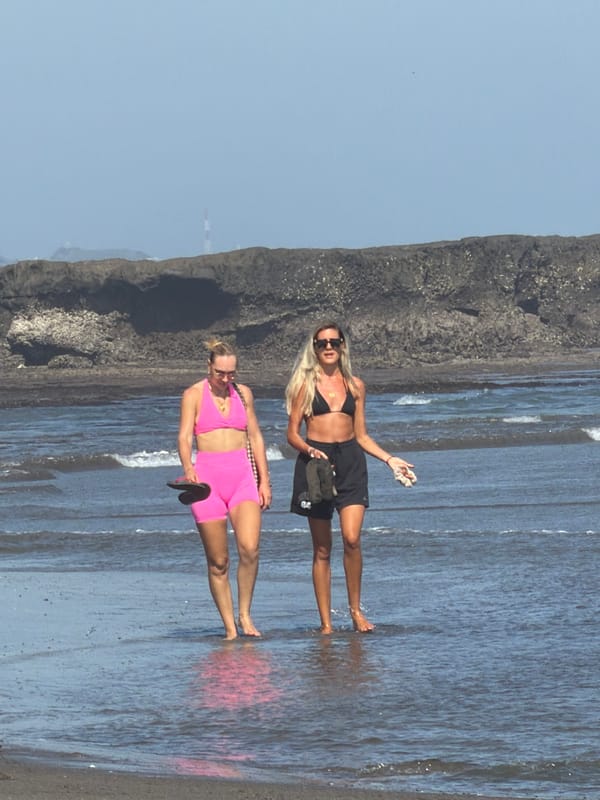 Morning beach activity on Bali's North Kuta shore