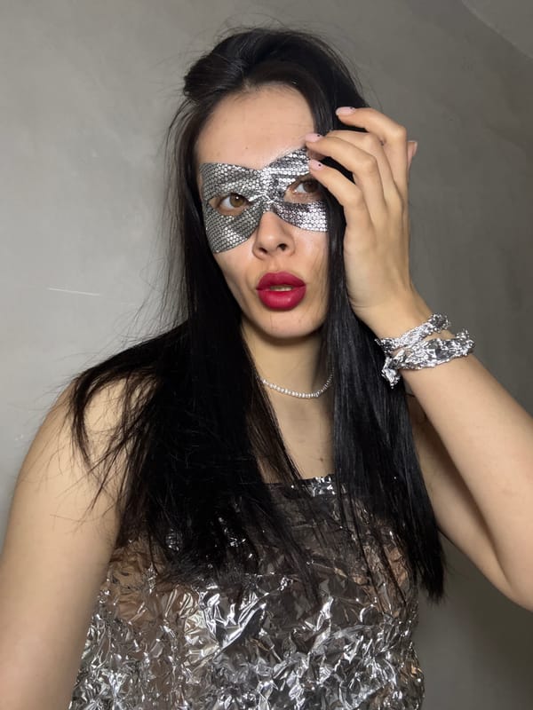 Masked woman in silver outfit photographed in Votkinsk