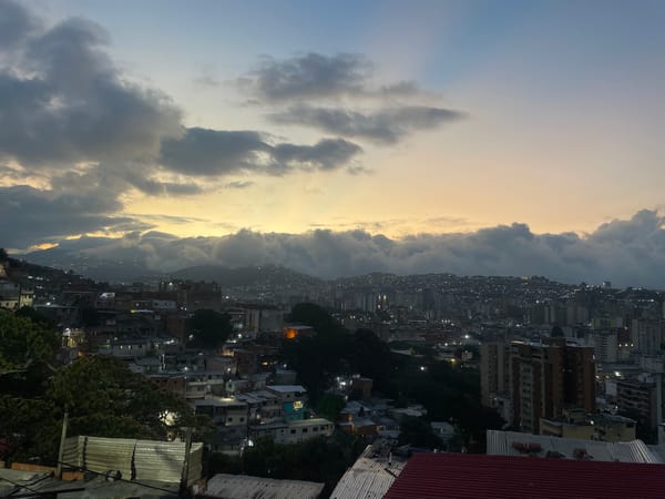 Aerial views capture Caracas cityscape at dusk
