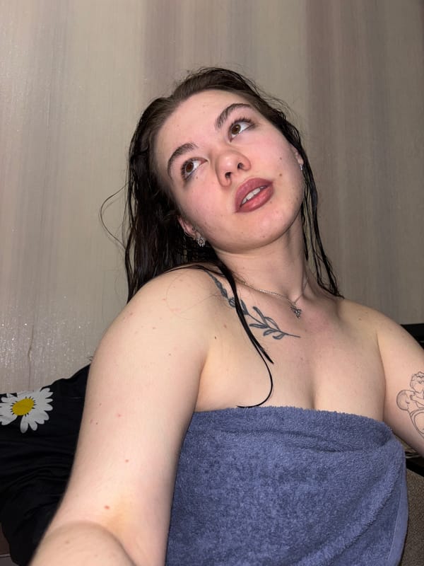 Woman poses for UV photography session in Perm