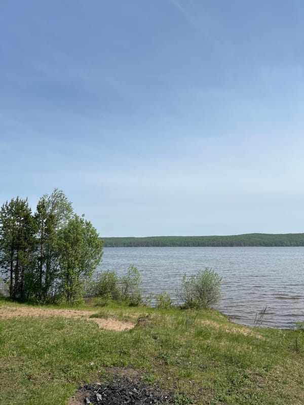 Family enjoys early morning outing at Kama River, Chaikovsky