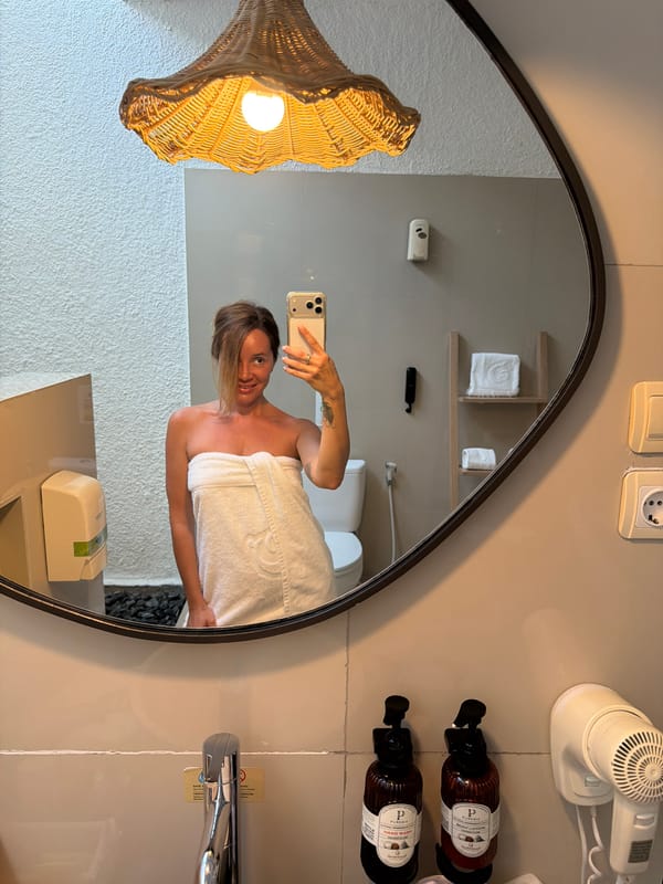 Tourist documents morning leisure activities at Indonesian beach resort
