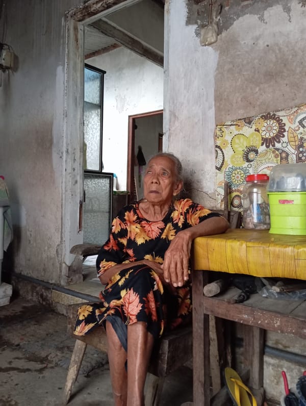 Elderly women prepare traditional meals in Baron, Indonesia kitchens