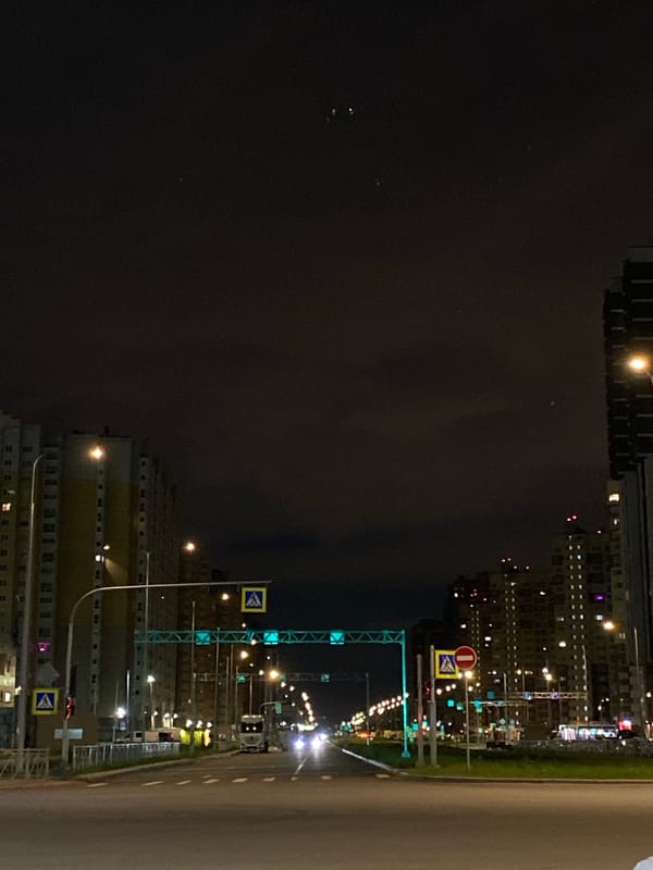 Nighttime street scenes documented across Saint Petersburg neighborhoods