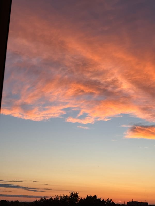 City sunset documented from multiple angles, June solstice evening