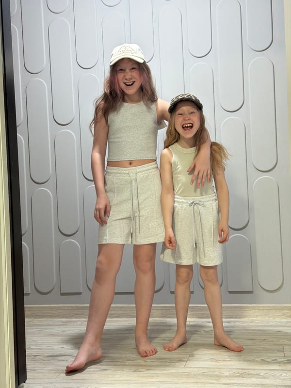 Two girls play indoors in Markovo, Russia residence