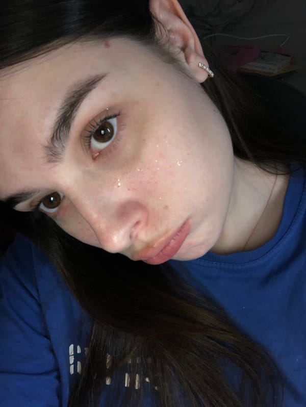 Woman takes glittery selfie in Noviy, Russia