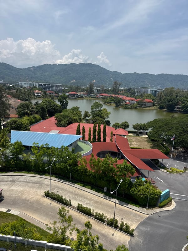 Aerial views capture Choeng Thale's lakeside homes and roundabout