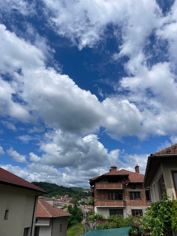 Morning views of Bulgarian mountain town documented under cloudy skies