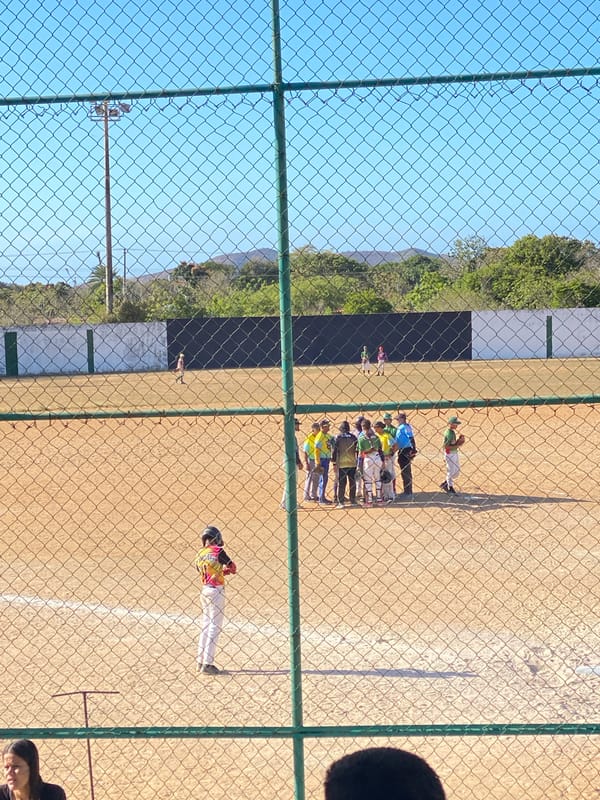 Youth baseball game draws spectators in Juan Griego, Venezuela