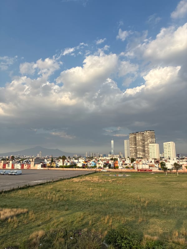 Weather transition captured over San Bernardino Tlaxcalancingo cityscape