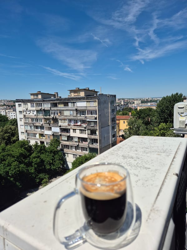 Espresso with a view, then a quick smile for the camera