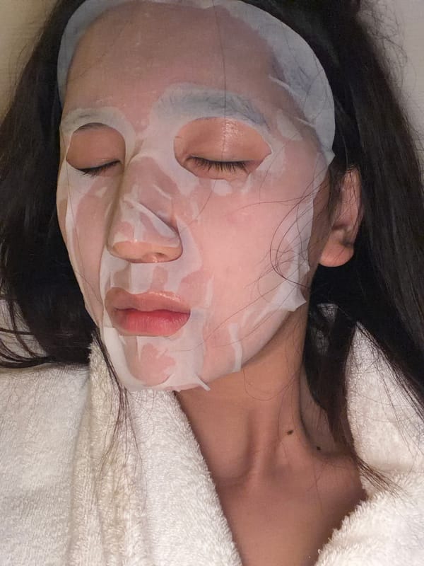 Person applies facial mask in French Riviera town