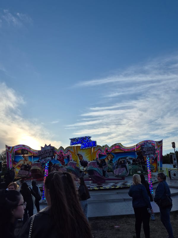 Fairground ride operates in Targovishte under bright afternoon skies