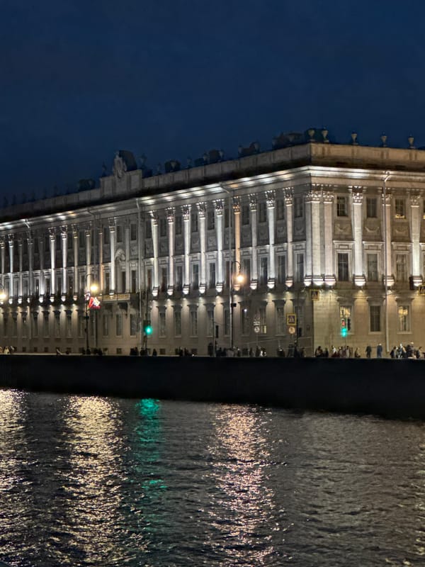 Saint Petersburg's illuminated waterfront captured during evening hours