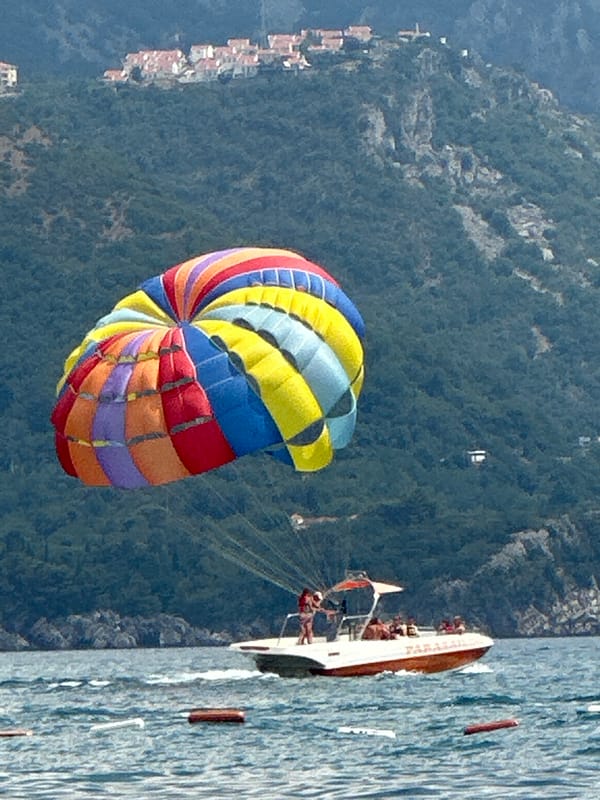 Parasailing and water sports fill a summer afternoon in Boreti