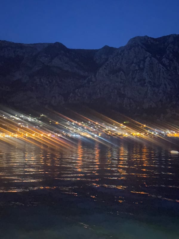 Evening cruise ship visit draws observers to Risan waterfront