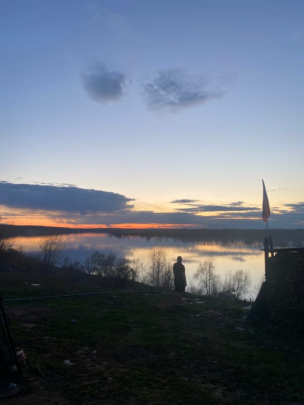 Sunset documented over water in Ольховка, Russia April 30