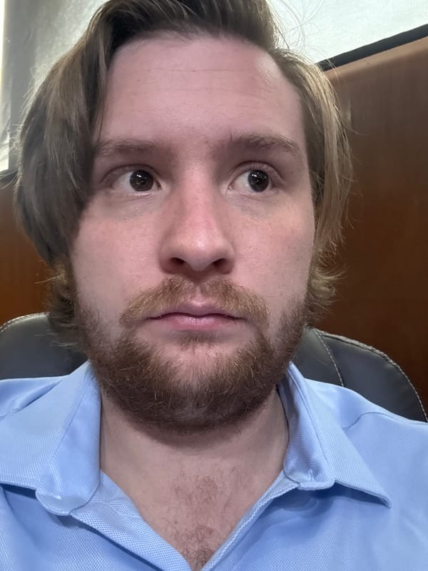 Office workers gather around desk in Cuautitlán Izcalli