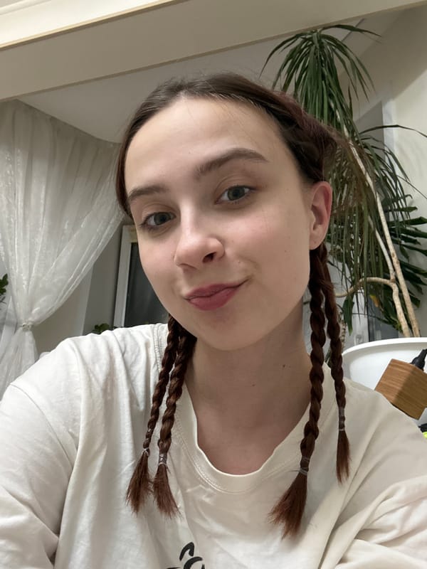 Woman photographed indoors in Vogulka, Russia