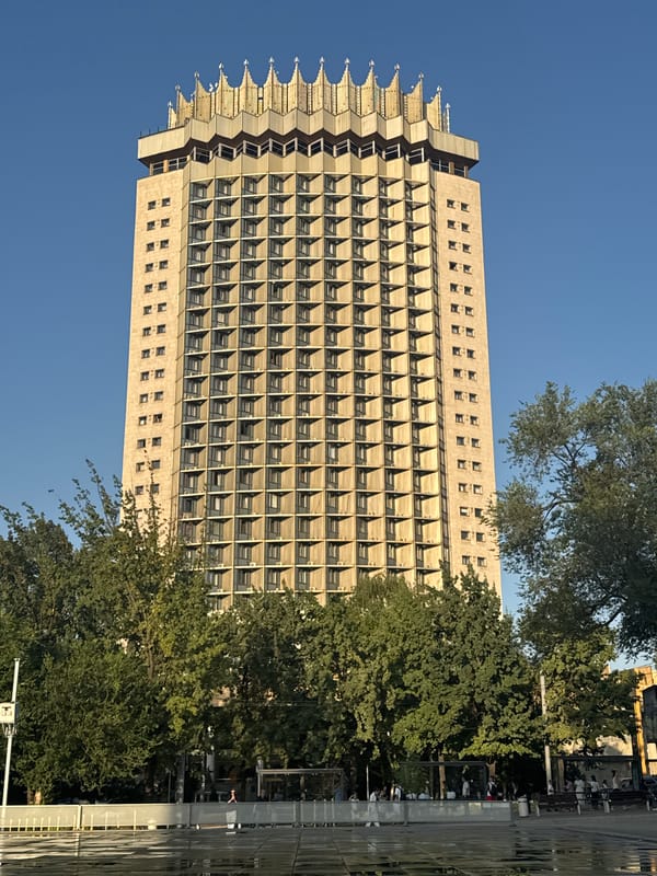 Kazakhstan Hotel's crown-topped tower rises over central Almaty