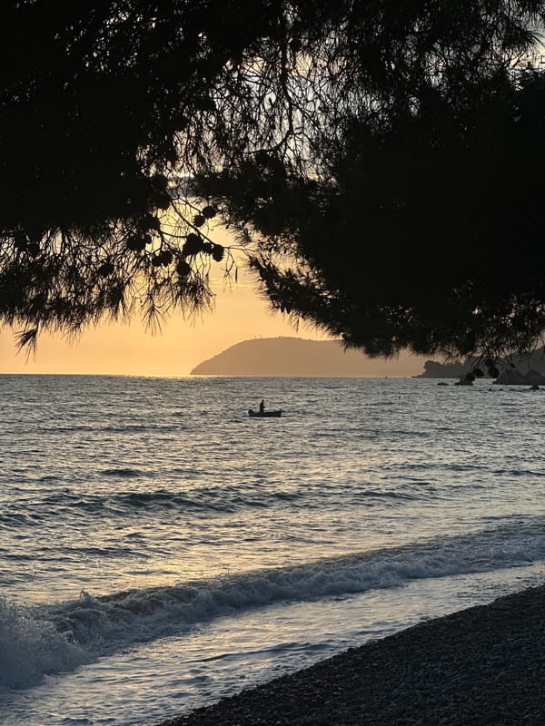 Paddleboarder enjoys calm waters off Montenegro coast