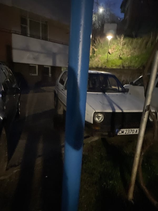 White Lada parked on Zlatograd street at night