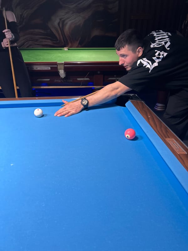 Man plays billiards in Haskovo, Bulgaria
