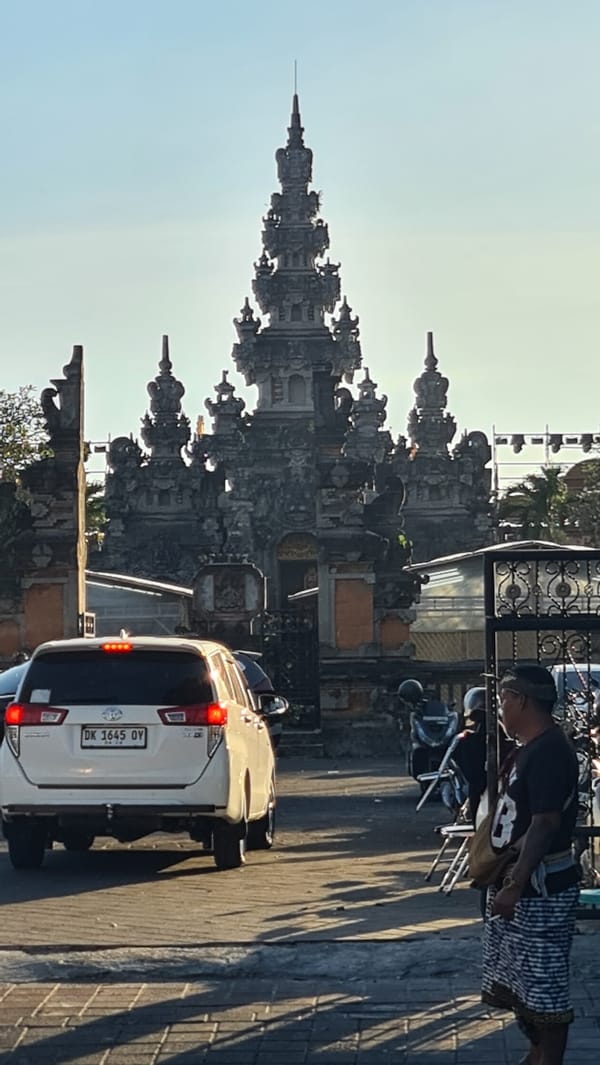 Temple, street food, and morning traffic in Denpasar