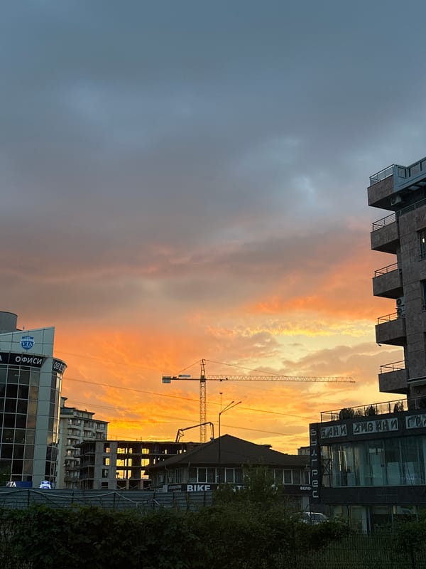 Dramatic sunset colors illuminate Sofia skyline